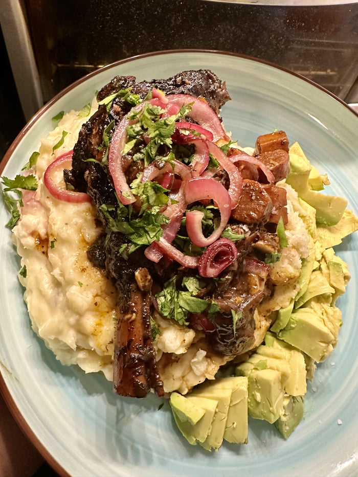 Braised Lamb Shank With Mashed Cassava Avocado And Pickle Onions Gag