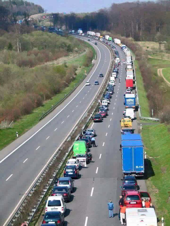 When traffic comes to a complete stop in Germany, the drivers, by law, are required to create an open lane for emergency vehicles