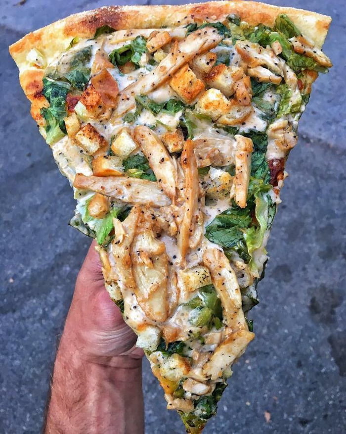 To all the people complaining about pineapple on pizza, here is a chicken Caesar salad pizza