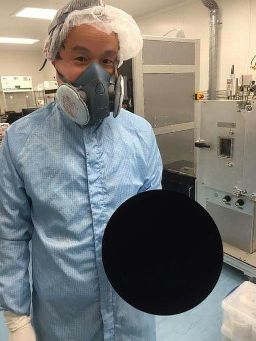 The circle you see is actually a sphere. it's looking 2D because it's covered in Ventablack .