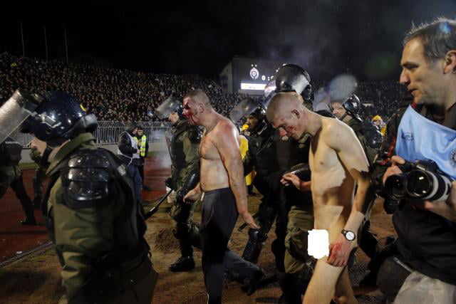 Naked Hooligans Being Dragged Out On Partizan Redstar Serbian Derby