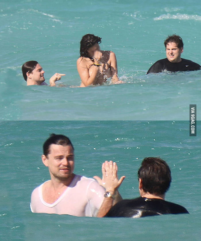 Leonardo Dicaprio And Jonah Hill Giving Each Other A High Five After