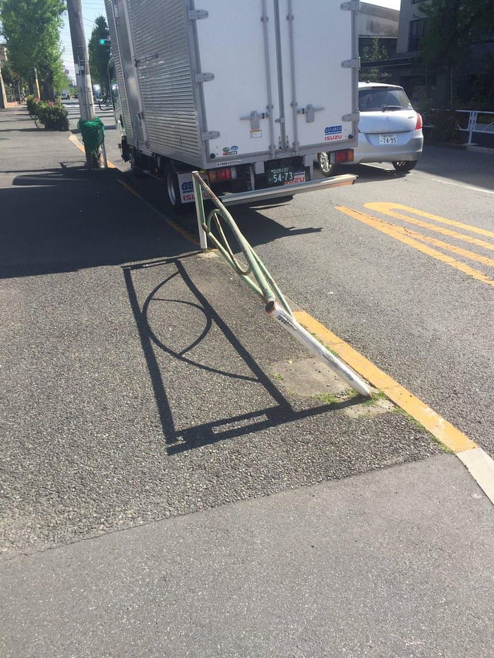 Bent gate, straight shadow