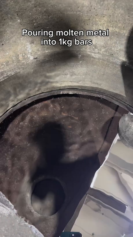 Pouring molten metal into 1kg bars