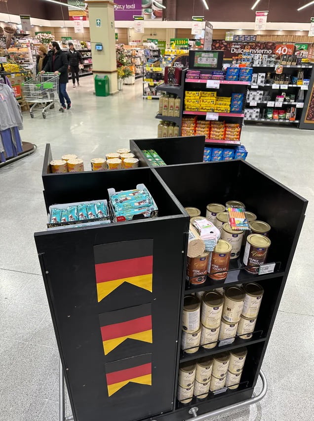 Hey designer, i need a shelf to display german products in a chilean supermarket 9GAG