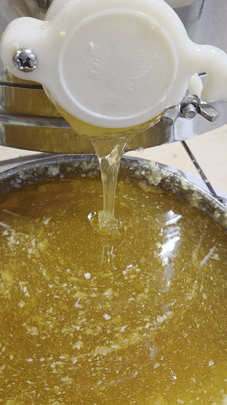 Harvested 6 boxes of honey from my 3 bee hives today. Here it is pouring into the filter. Probably going to be almost 25 kg.