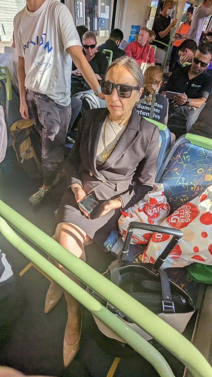 This Lady Taking Up A Seat With Her Bags On A Packed Train Gag