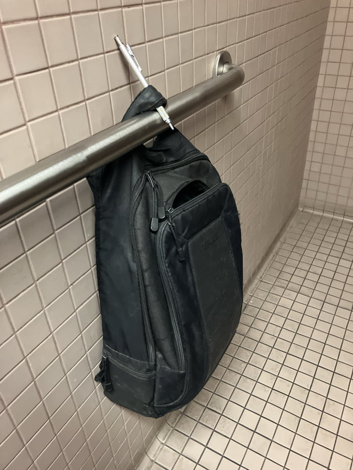 When theres nowhere to hang yer backpack while you shit