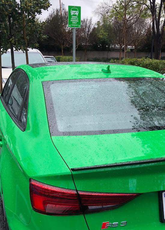 Green vehicle parking only...