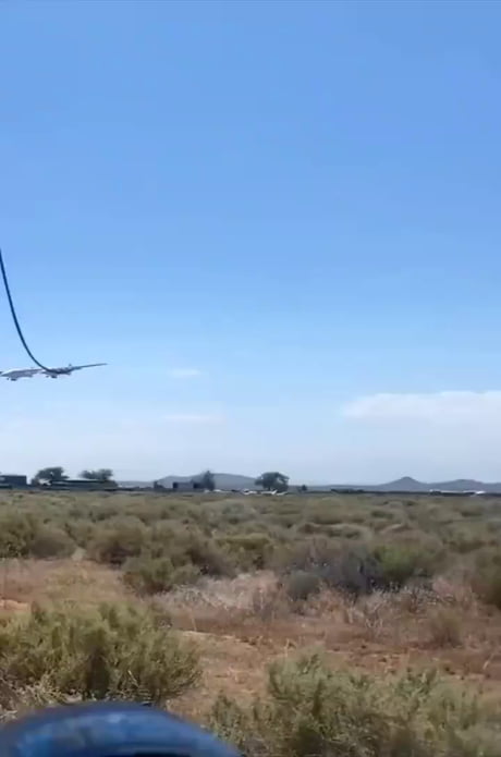 The world’s largest flying aircraft, Roc — which looks like two 747s fused together and has a wingspan larger than a football field, flying over California today.