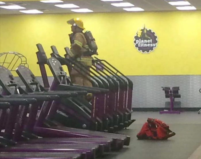 Firefighter fully suited climbing the amount of stairs in the WTC in honor of his fallen brothers