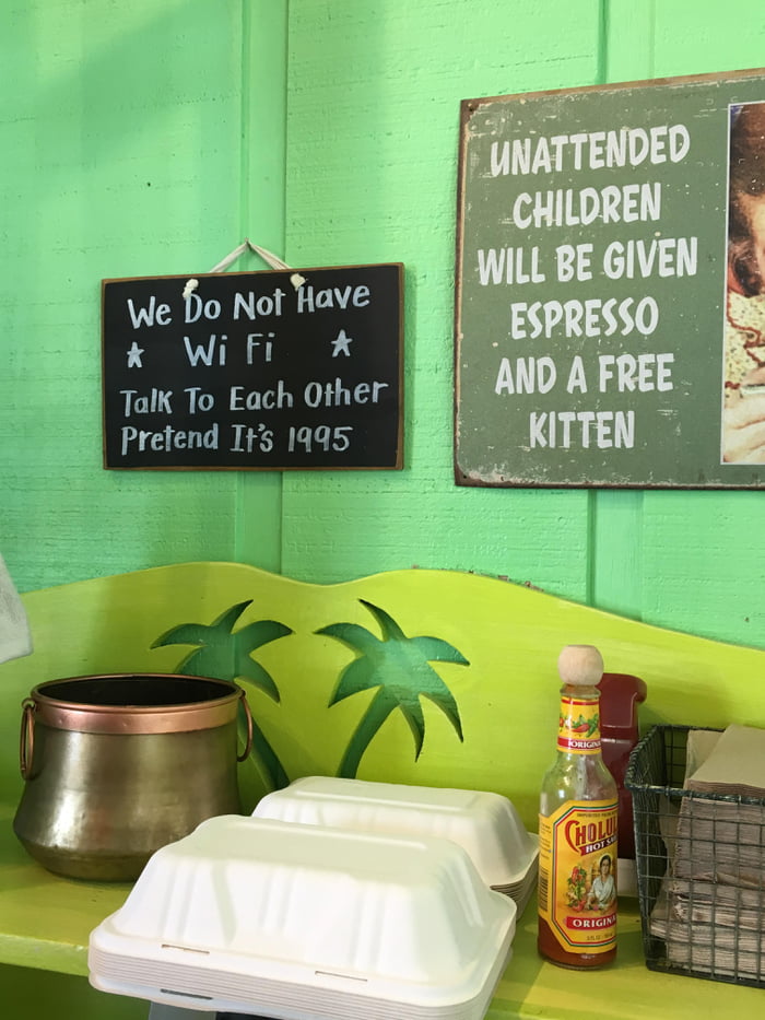 Cafe advertised Wi-Fi on website, inside they have a condescending sign