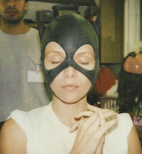 Michelle Pfeiffer trying on her Catwoman mask for Batman Returns, 1992 -  9GAG