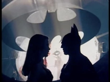 Love this picture of Chase Meridian and Batman from the behind the scenes  footage of Batman Forever. The way the Batman signal is in the background  looks perfect. - 9GAG