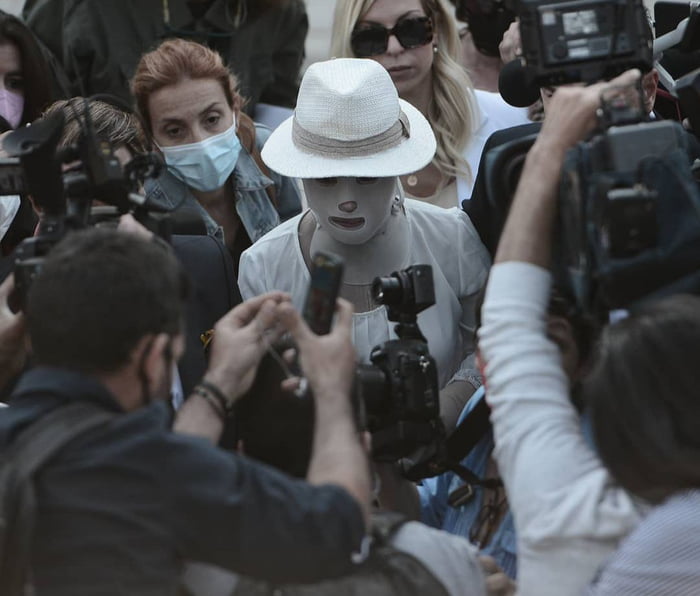 Acid attack victim in Greece arrives at the court to face her attacker. What a fighter.