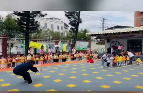 Security guard threw Candy at students to Win tug of war