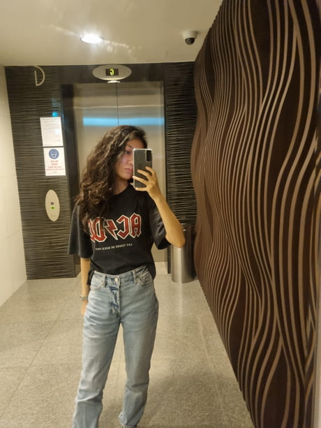 girls - baggy AC/DC shirt and mom jeans 