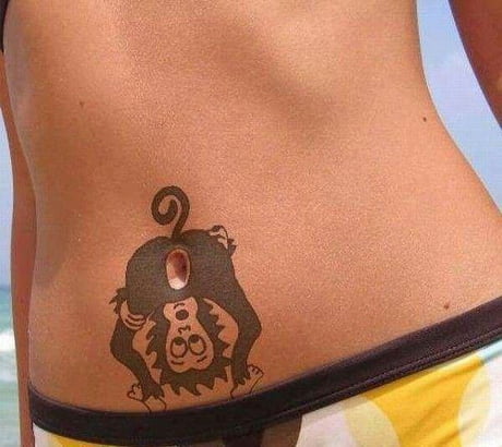 pigeon belly button tattoo