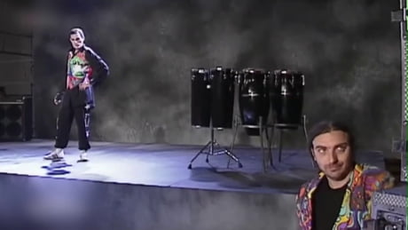 Freddie Mercury walks off a stage for the final time