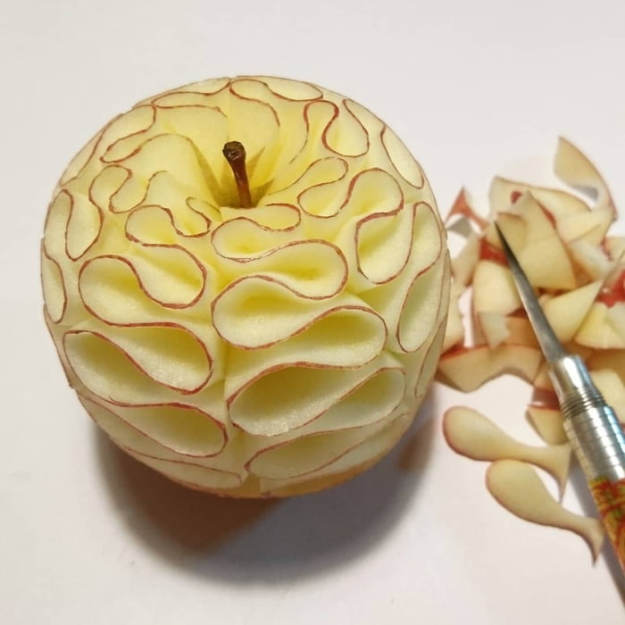 Apple hand carved with Xacto knife.