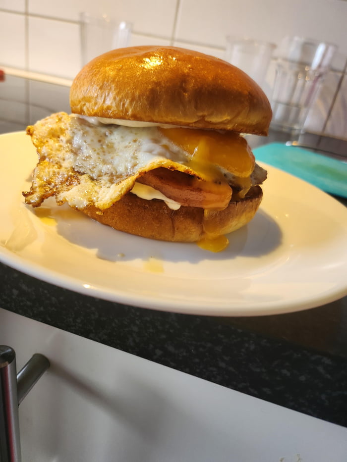 Bologna burger with brioche bun, aioli and fried egg... - 9GAG