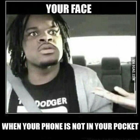 What is the name of the meme face on the phone. - 9GAG