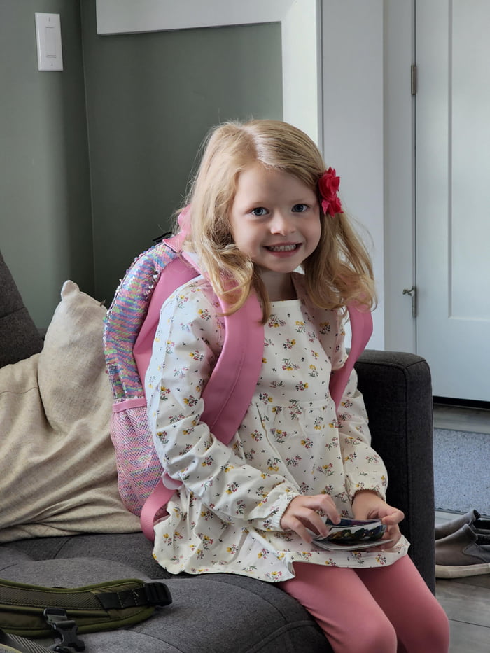 Today is her first day of Kindergarten. She's been dressed with her