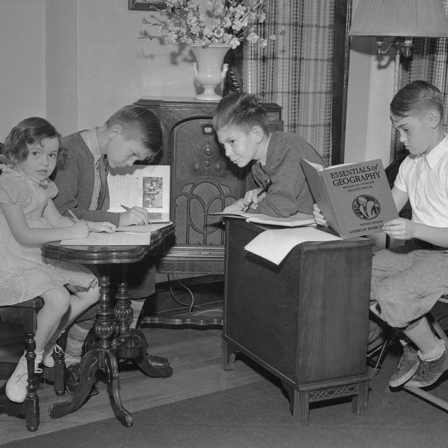 Kids remote learning during a polio outbreak in the 1940s. Teachers read lessons over the radio!