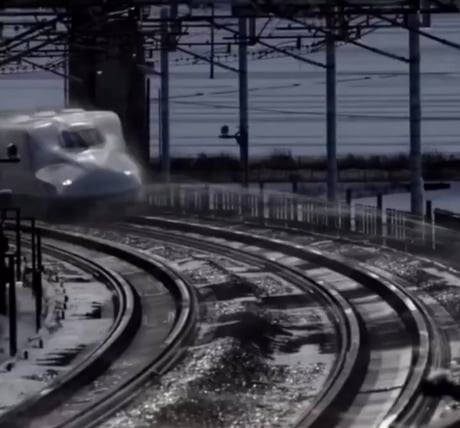 Why are high-speed trains sprayed with water when they arrive at the station?