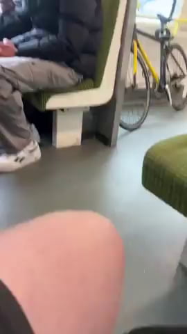 An empty train, yet three men crowded a lone woman, until a watchful hero stepped in and made them move.
