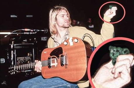 Kurt Cobain holding the Pick of Destiny - 9GAG