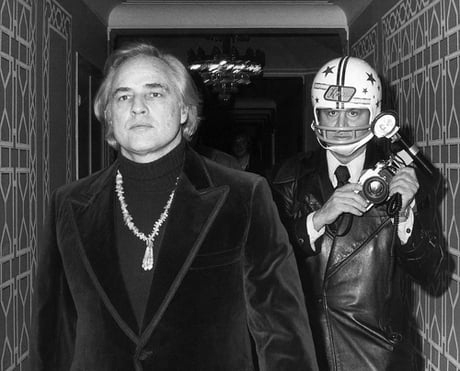 Paparazzi photographer Ron Galella wore a football helmet around actor Marlon Brando, after Brando once punched him, broke his jaw, and knocked out five teeth for constantly photographing him in 1973.
