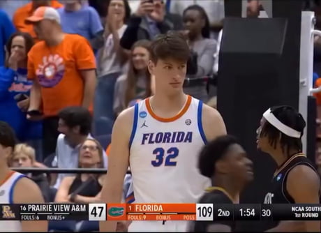 The dude in the headband is 6'8