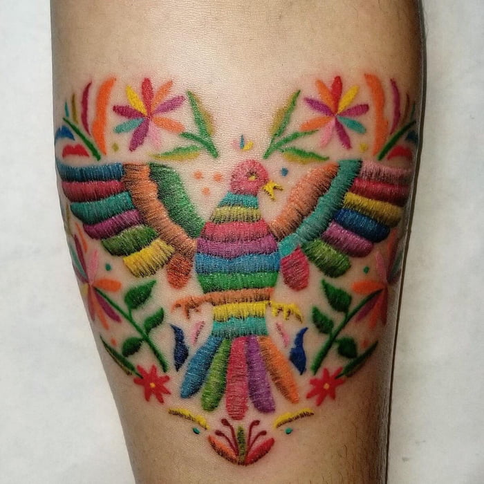 This embroidered tattoo is incredible.