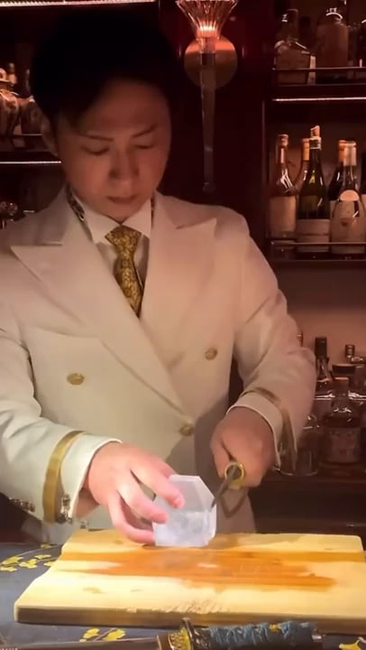 Bartender prepares ice