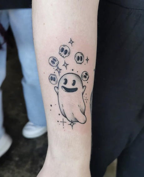 Single needle ghost tattoo on the bicep