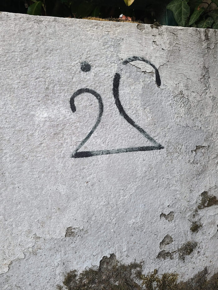 Noticed this painting near my flat, does anyone know what it means? 9GAG