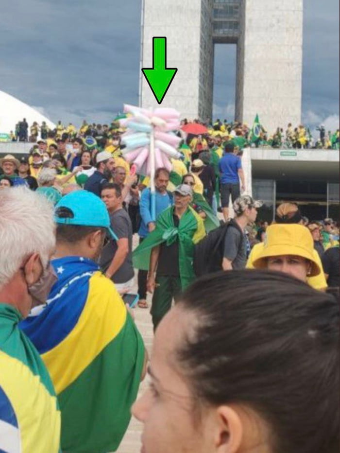 Sorry for the arrow, but can we respect the fact that during an insurrection that guy is selling cotton candy?