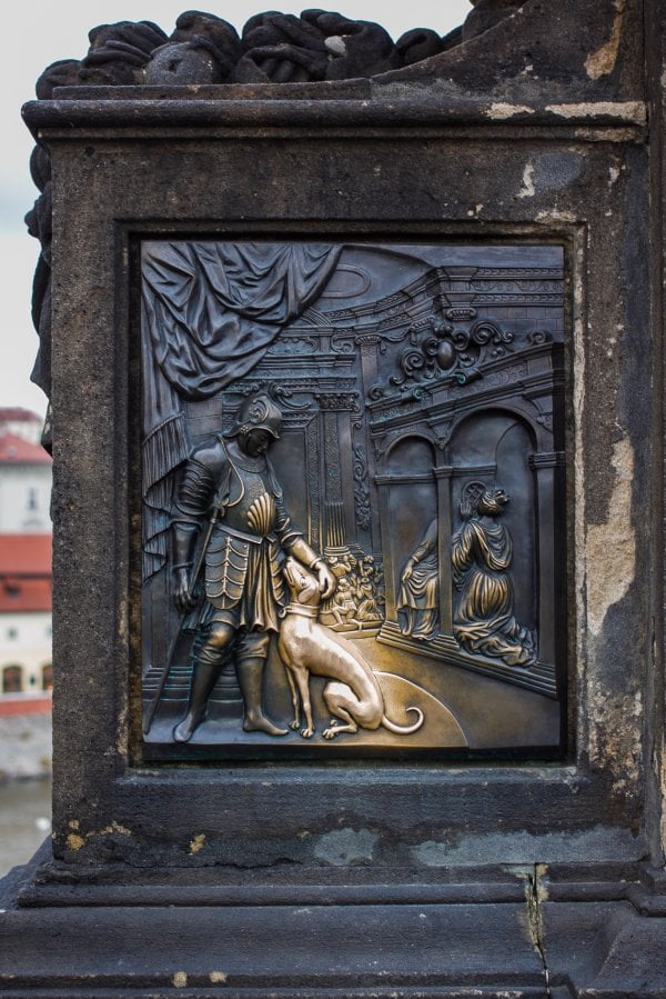 The most petted dog in Prague is on the St John Of Nepomuk Statue