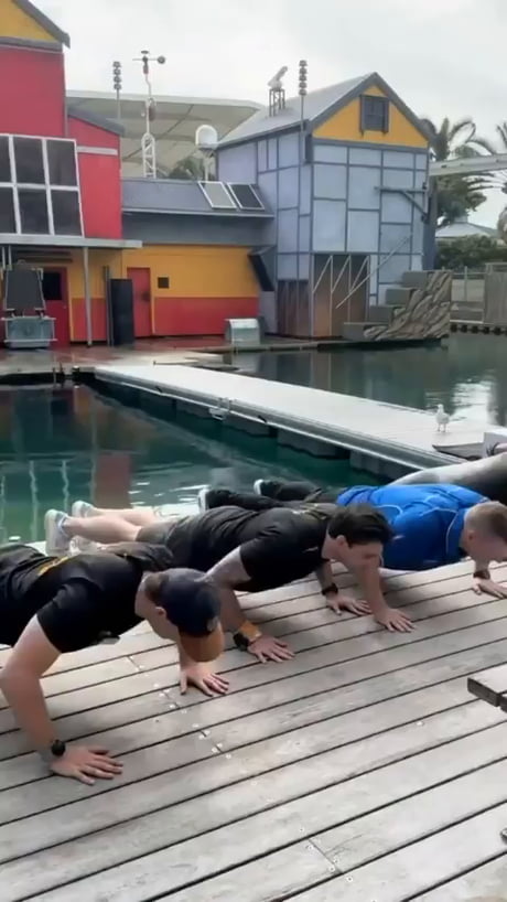Watch as friends push through the challenge right by the water's edge