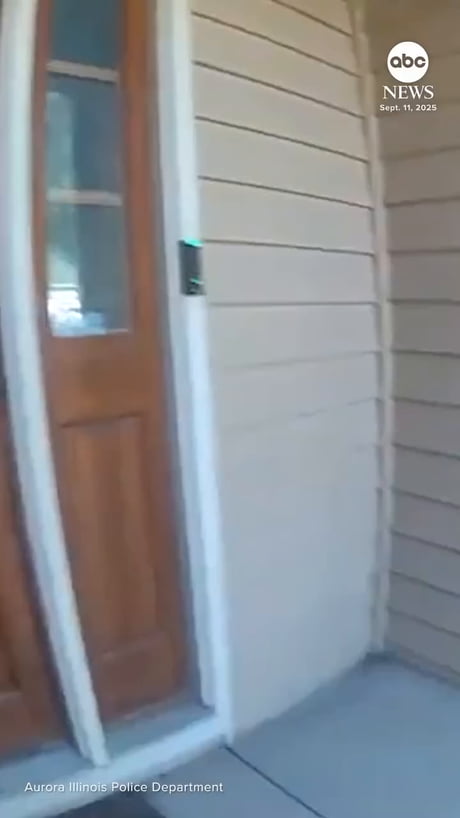 Dog leads officer to his leash before being led out the door. DOG: 