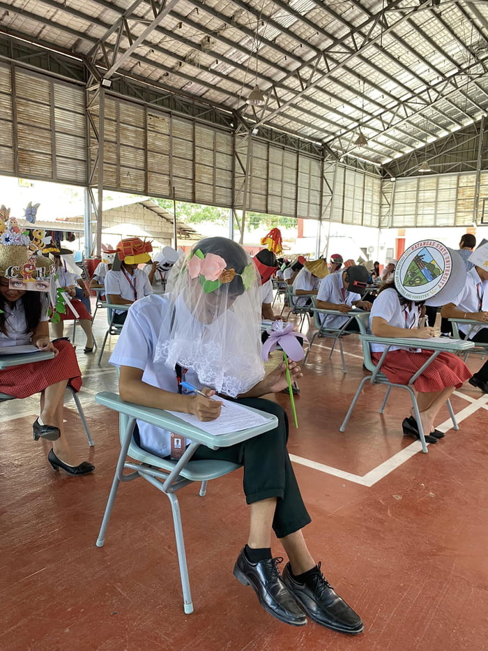 Filipino University Students' Anti-Cheating Exam Hats Go Viral - 9GAG