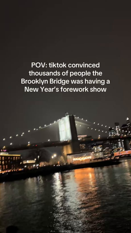 Look at all these Americans flocking to the Brooklyn Bridge for a fake fireworks show…