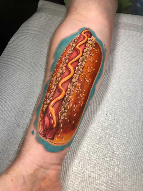 I got a tattoo of a corn dog  its being compared to a lesion and that  isnt the worst thing people say it looks like  The US Sun