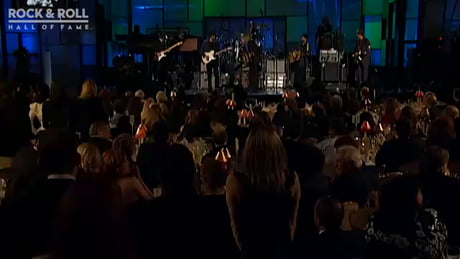 Prince @ minute 3:30 showing everyone how it is done. His guitar solo is a masterpiece recorded for the ages. He only did this once in front of an audience, once.