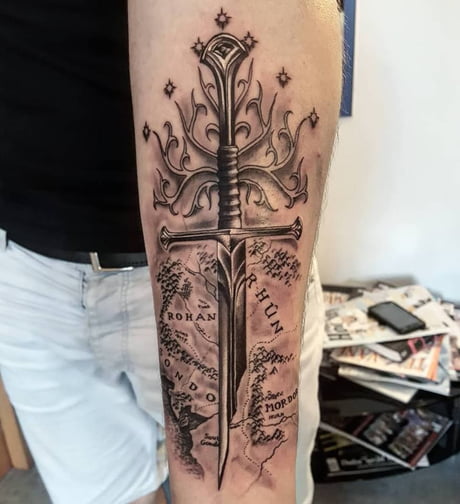 65 Epic Sword Tattoo Ideas: Unleash Your Inner Warrior - ARTWOONZ