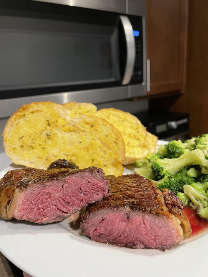 Grass fed NY strip steak, reverse seared in beef tallow and rosemary in