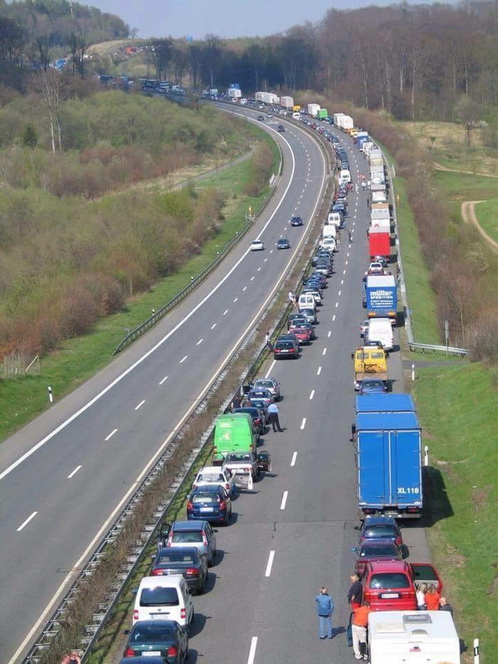 When traffic comes to a complete stop in Germany, the drivers, (by law) must move towards the edge of each side to create an open lane for emergency vehicles. . . Why don't we have these rules?