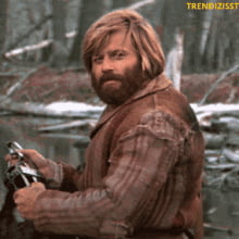 He is the meme guy too. This is him. From the 1972 movie Jeremiah Johnson.