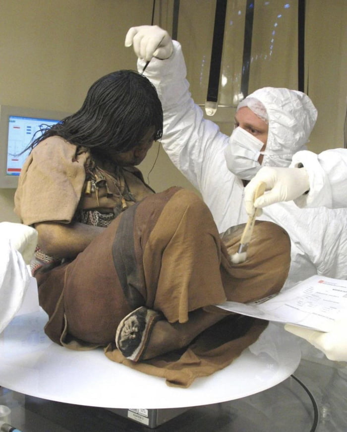 Scientists examining the perfectly preserved body of 15 year old ‘La Doncella’ who died 500 years ago. The frozen bodies of the 22,000 foot summit of Mount Llullaillaco - A volcano near the Chilean border - are among the best preserved mummies ever found.